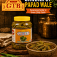 Sardar Ji GTB Green Chilly Pickle jar with label and bowl of pickles on a rustic background